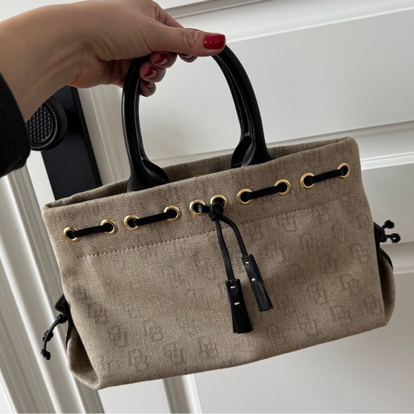 Dooney & Bourke Vintage Beige Canvas Handbag with Black Accents - Picture 2 of 9